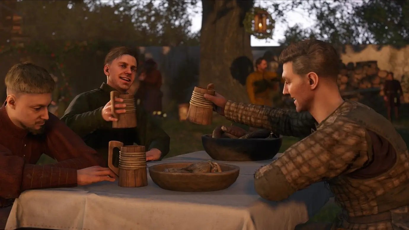 A group of men drinking at a table in Kingdom Come: Deliverance 2 - 1