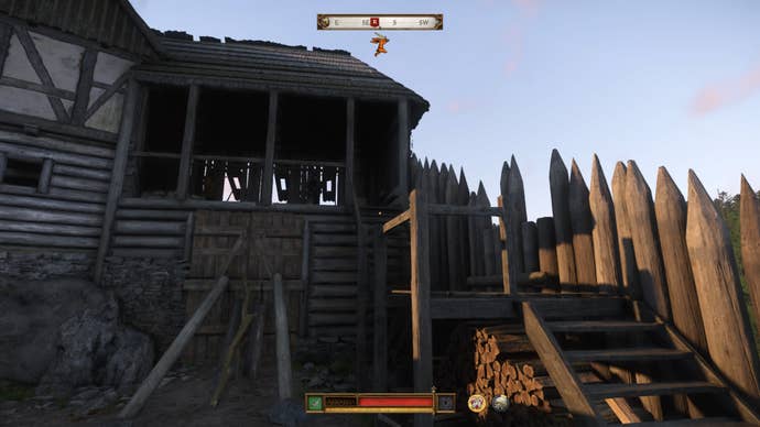 Henry climbing the barricade to defend Nebakov during the Finger of God quest in Kingdom Come Deliverance 2.