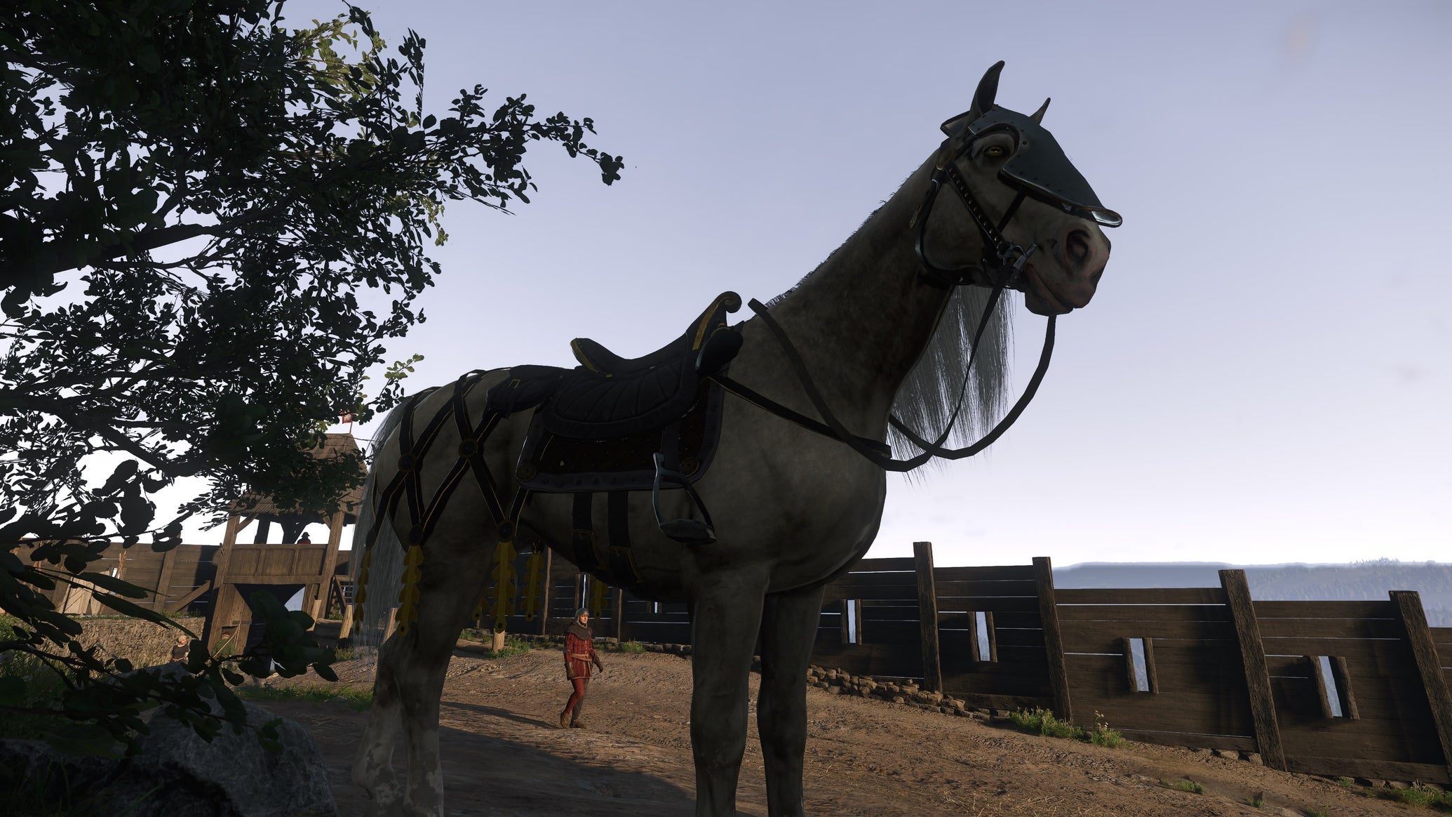 A fancy white horse, clad in saddle and armour, stands in Trosky Castle in Kingdom Come: Deliverance 2. - 1