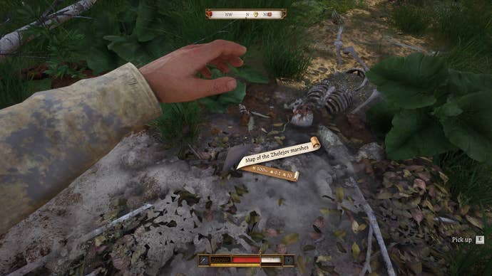 Henry in Kingdom Come Deliverance 2 looking at the map of Zheejov Marsh