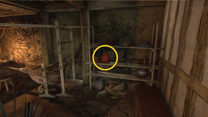 Part of a smithy in Trosky Castle in Kingdom Come: Deliverance 2, with a yellow circle highlighting a red pot on a back wall shelf.