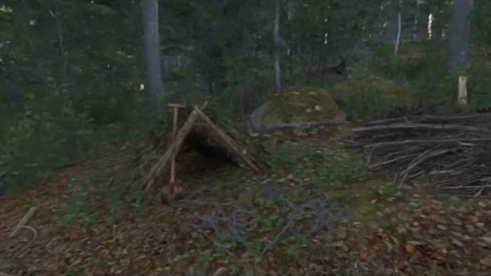 A small hut with a spade outside it in Kingdom Come Deliverance 2
