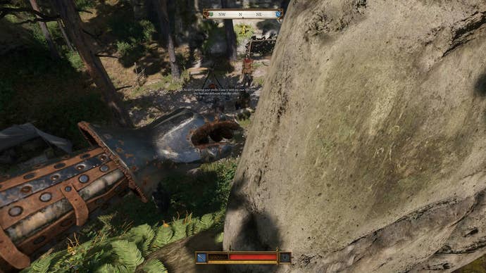 Henry looking down from a cliff onto a bandit camp during The Jaunt quest in Kingdom Come Deliverance 2.