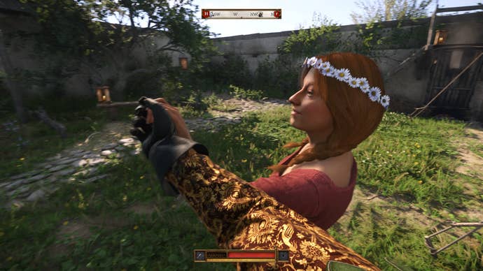 Henry dancing with a maid at the Semine wedding in Kingdom Come Deliverance 2.