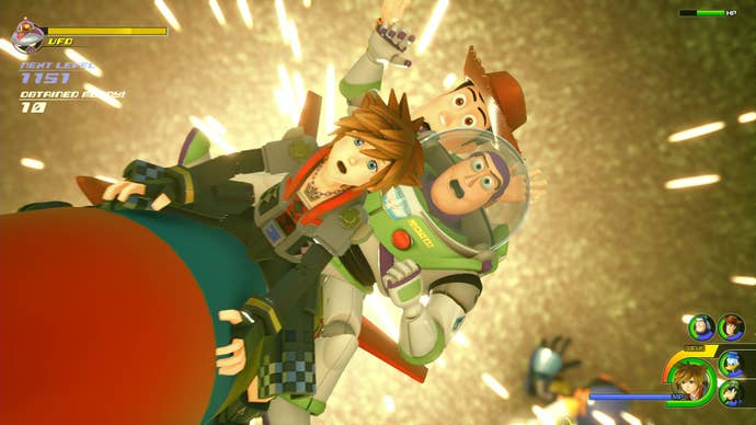Sora flies on a rocket with Buzz and Woody from Disney’s Toy Story in Kingdom Hearts 3.