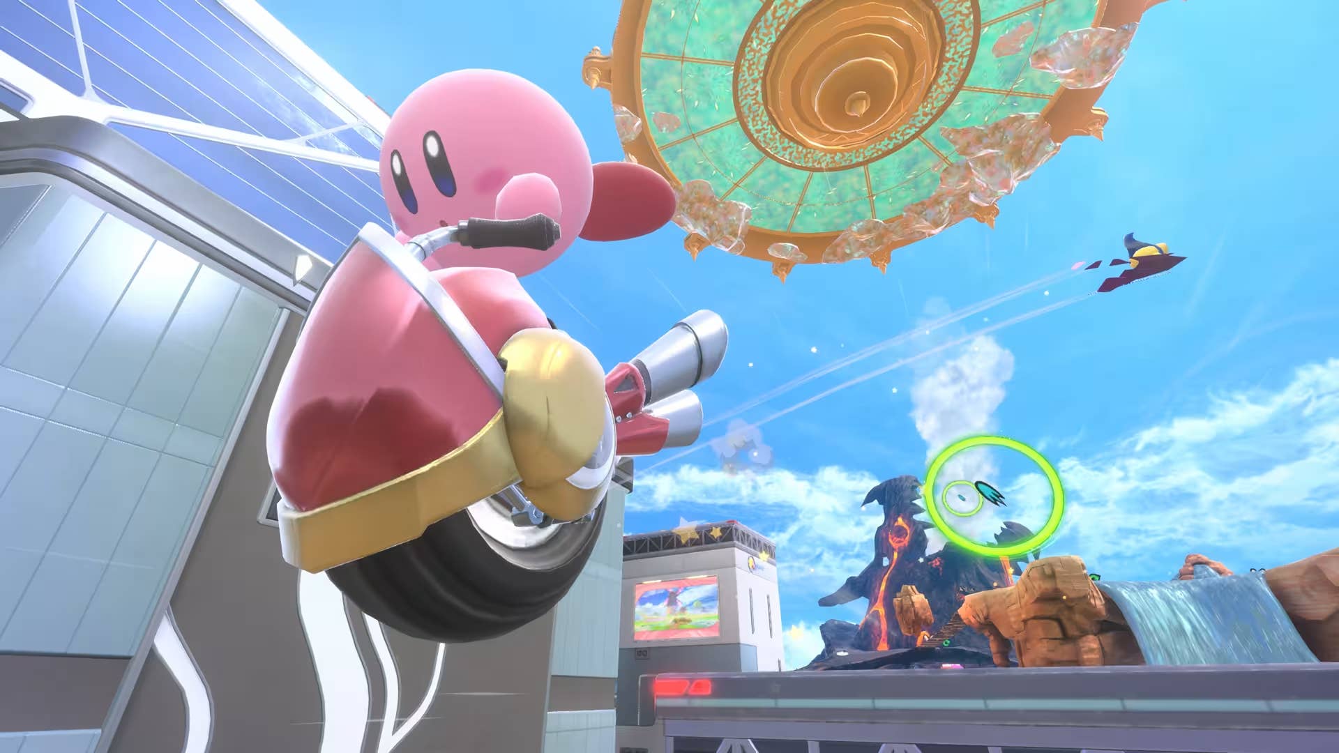Kirby, a sentient pink sphere with a face, zooms over a beach-like level in a one-wheeled motorbike.