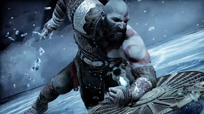 Kratos braces his shield against the ice in God of War Ragnarok