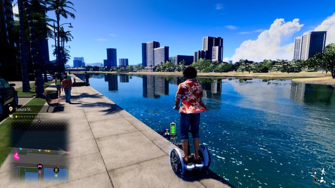In a screenshot from Like A Dragon: Infinite Wealth, Ichiban rides a segway along a lovely riverside path in Hawaii.