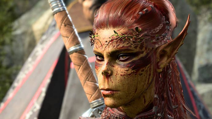 The companion character Lae’zel from Baldur’s Gate 3, close-up and looking suspiciously at the camera. She’s splattered in some red paint or is it dried blood? It’s not clear.