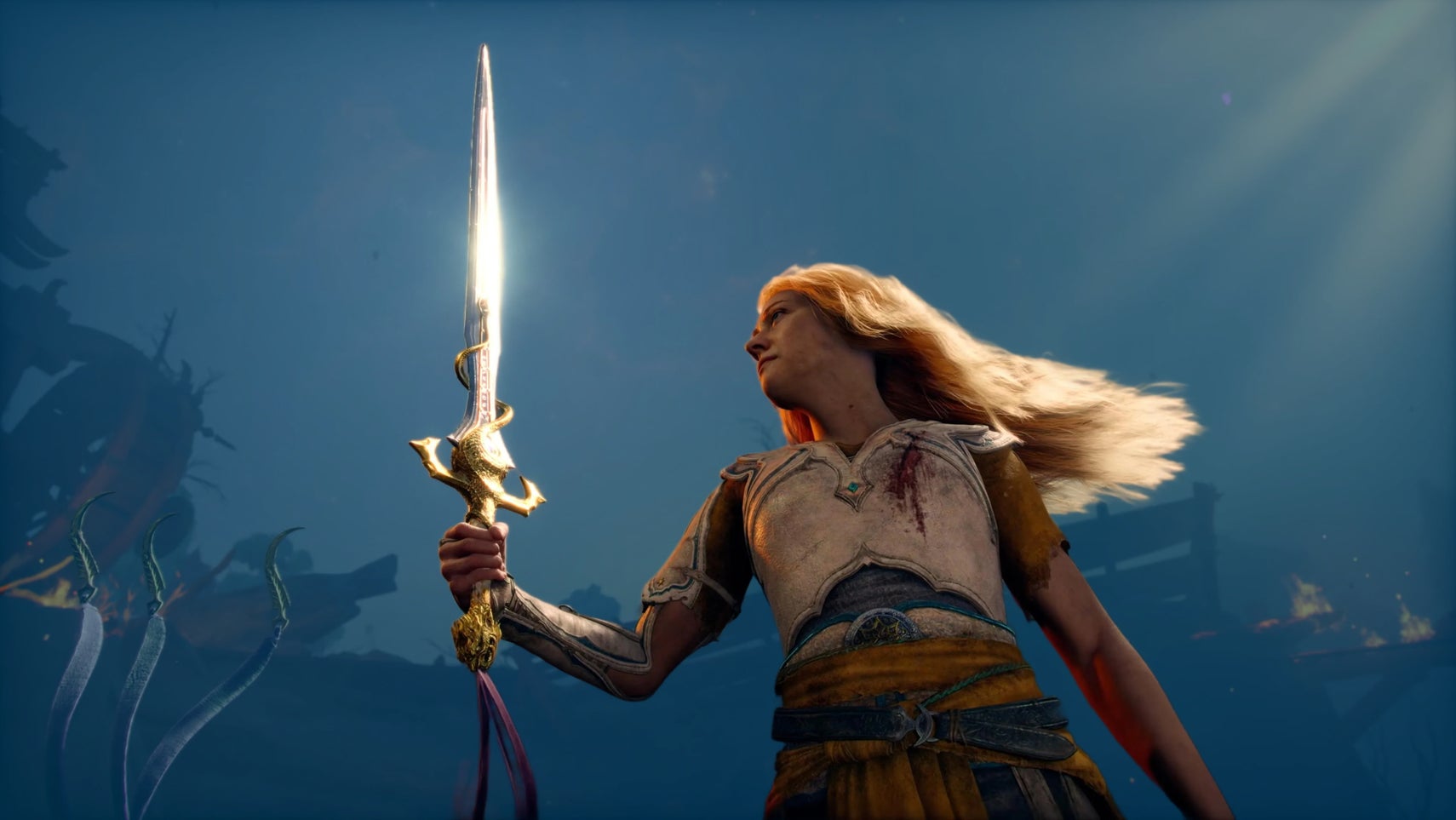Laufey as she appears in God of War Laufey, holding a sword against a blue background.