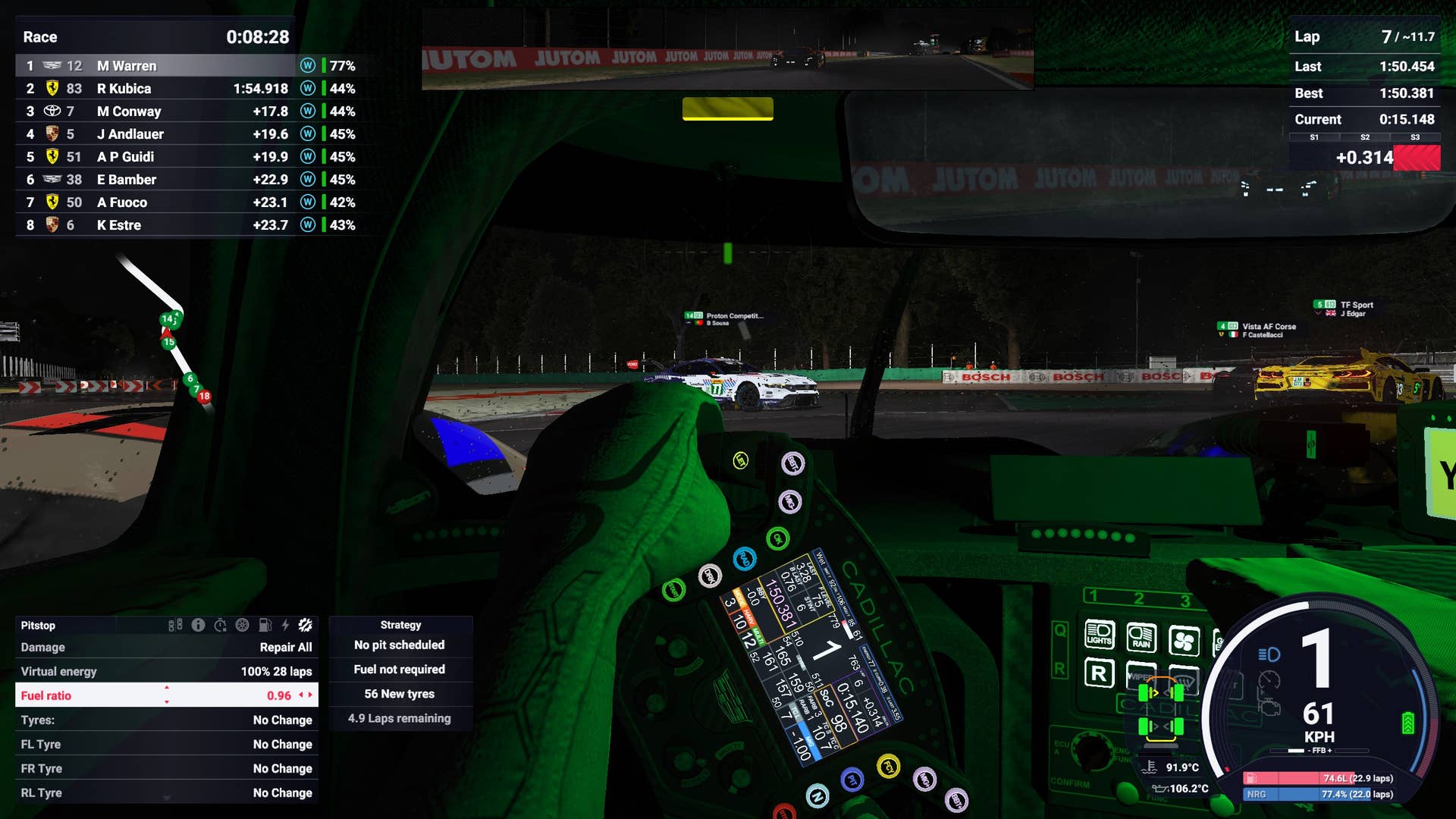 A cadilac hypercar is operated from the cockpit view at the latimat at night, as the GT3 cars proceed.