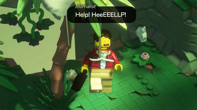 A journalist in Lego Bricktales, tangled up in a parachute hanging from a tree, screaming ‘HEEEELP!'