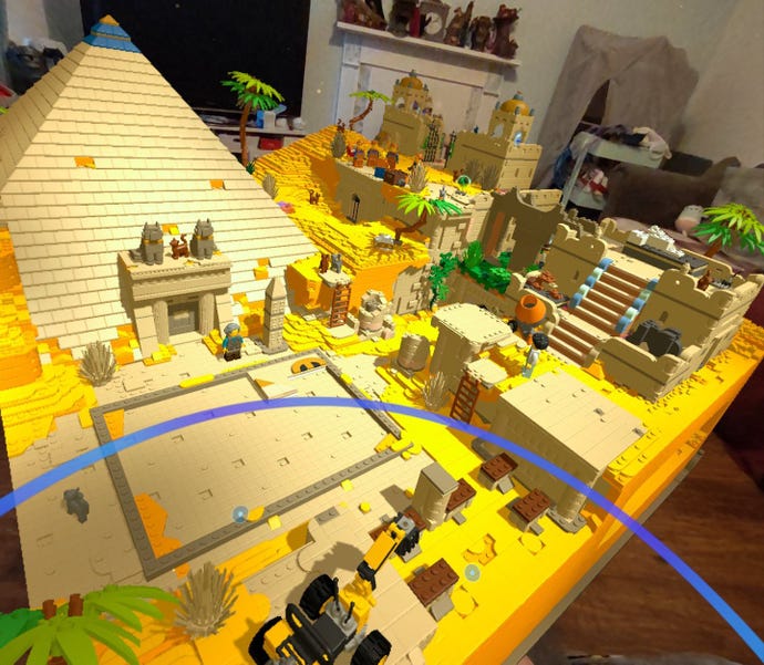 An Ancient Egypt-themed level in Lego Bricktales VR, with a large pyramid on the player's living room table