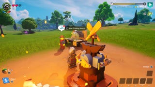 Lego Fortnite metal smelter: A Lego man in a black cloak is standing near his village center.