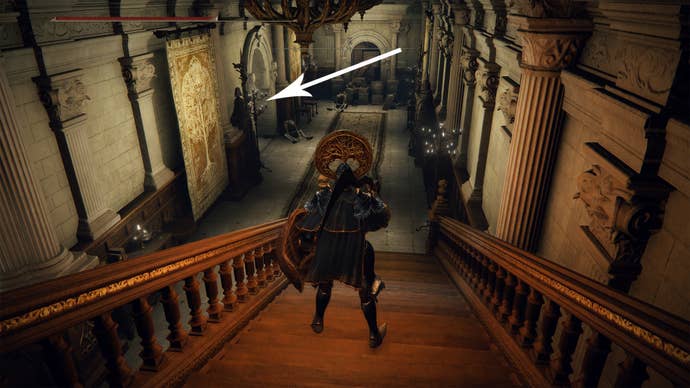 A player standing on a staircase in Leyndell, the Elden Ring capital.