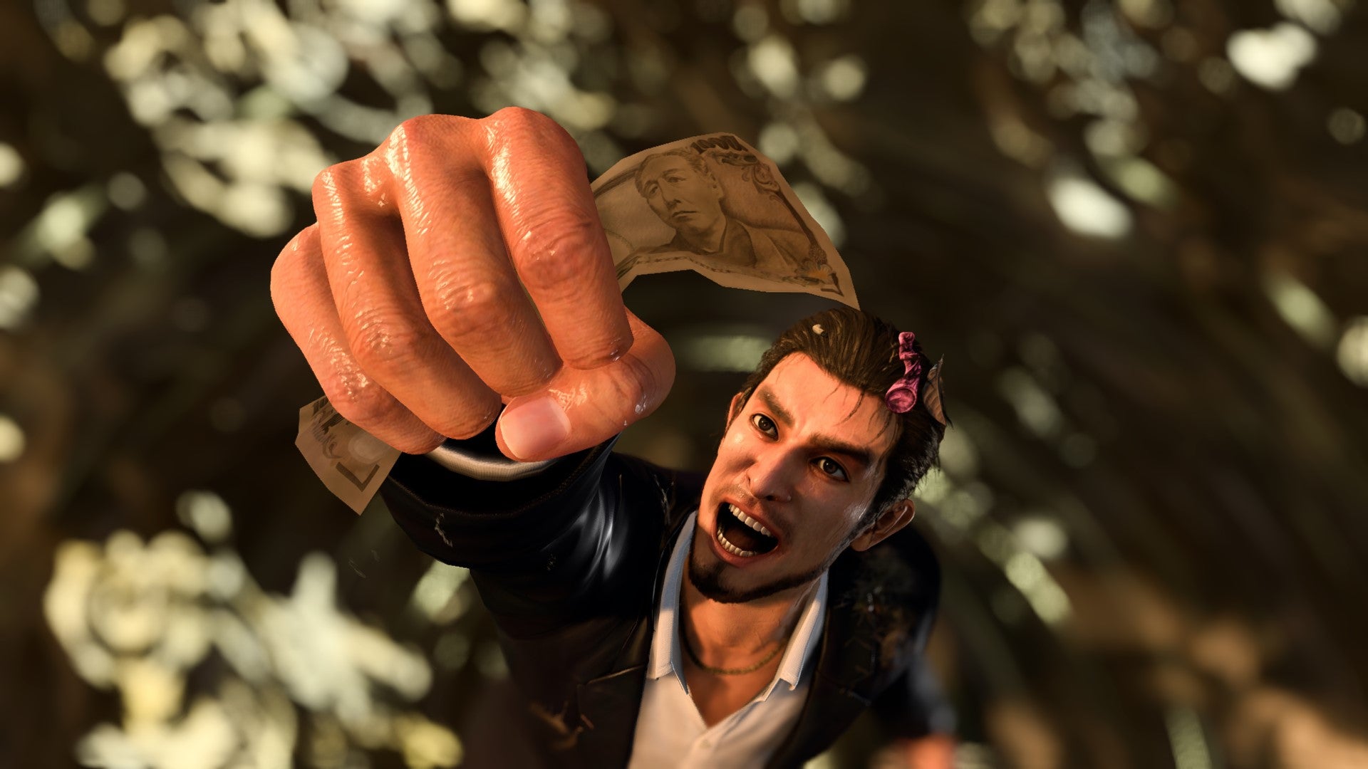 Ichiban Kasuga grabbing some cash in Like A Dragon: Infinite Wealth. - 3