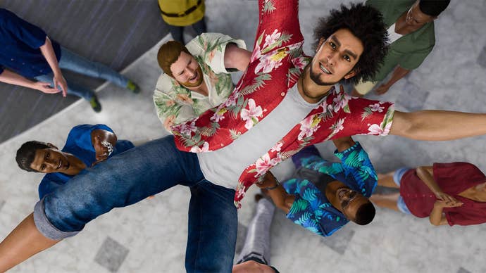 Like a Dragon Infinite Wealth, a happy Ichiban is being tossed in the air by other people.