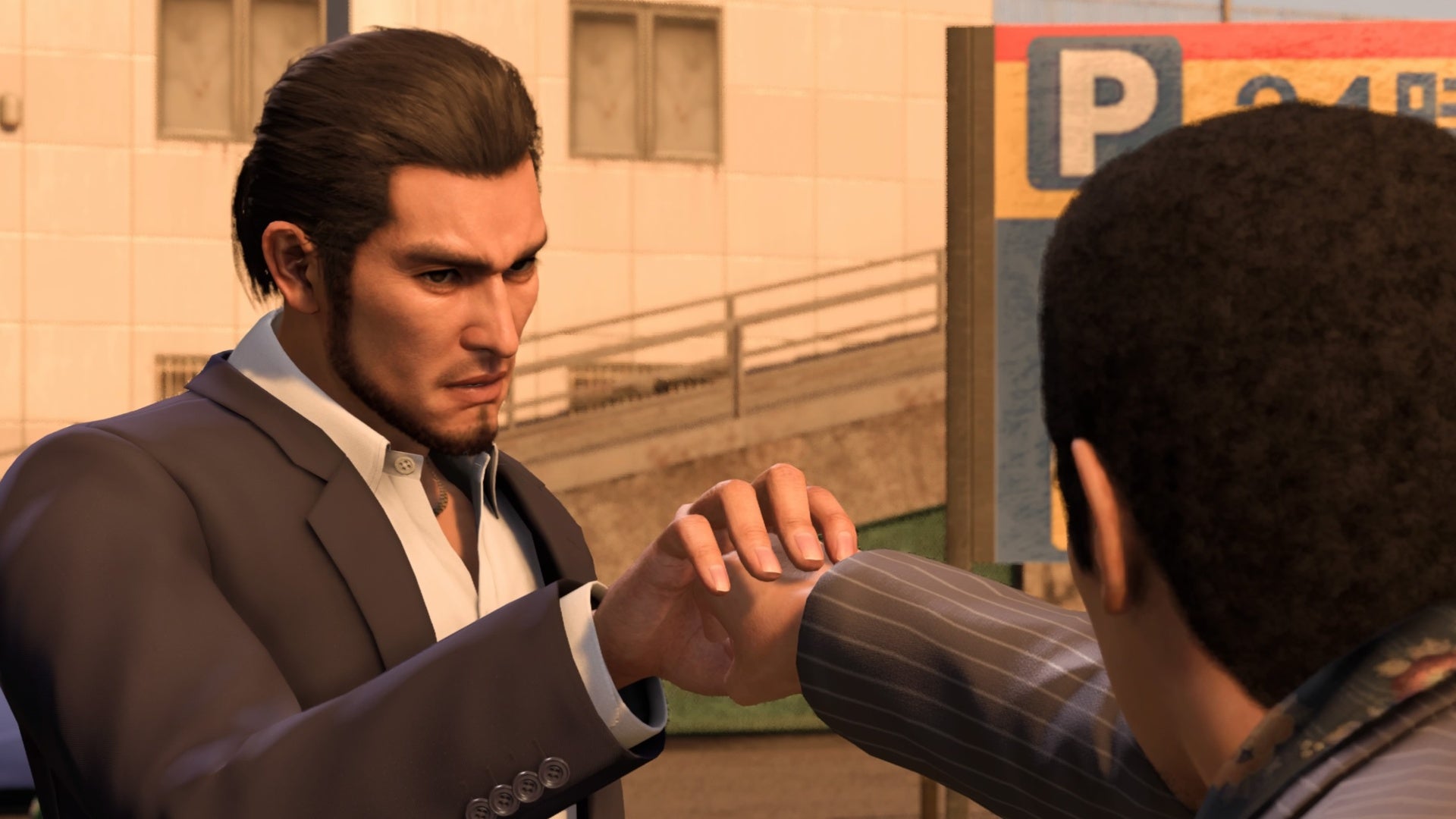 like a dragon infinite wealth kasuga stopping a punch