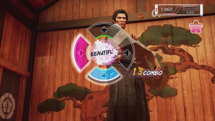 Ryoma (Kiryu) partakes in a traditional fan-dancing minigame in Like A Dragon: Ishin.