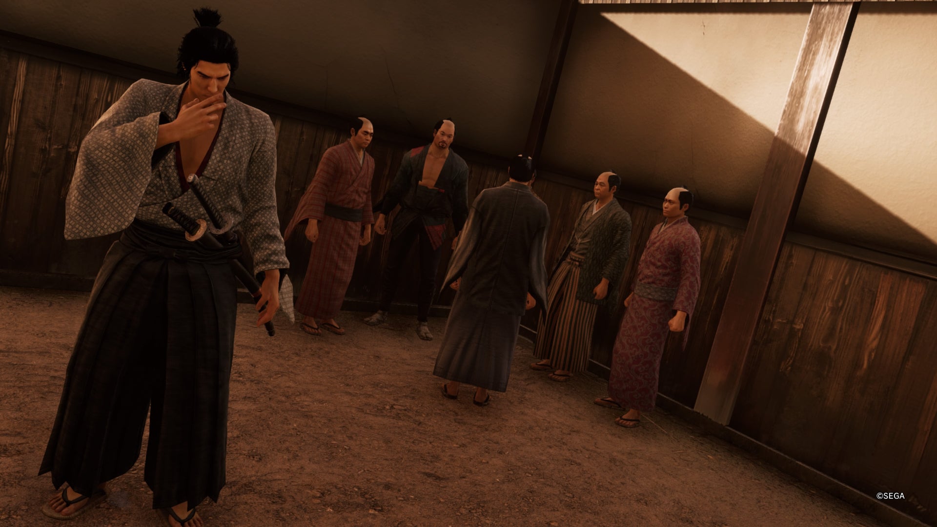 Like a Dragon Ishin, Ryoma is standing thinking next to a group of six men in Rakunai