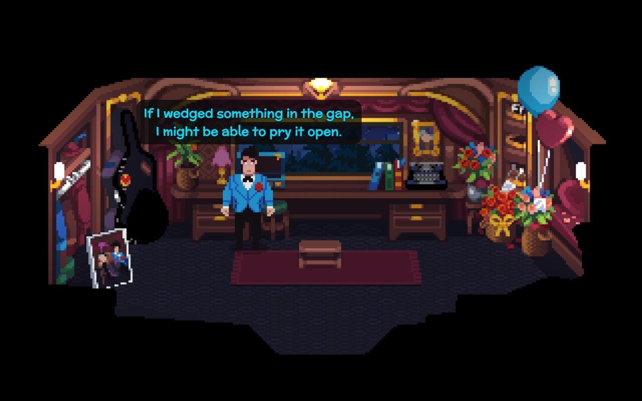 A man tries to prize open a locked drawer inside a train carriage in Loco Motive.