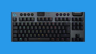 The Logitech G915 Lightspeed TKL Wireless keyboard on a blue background.
