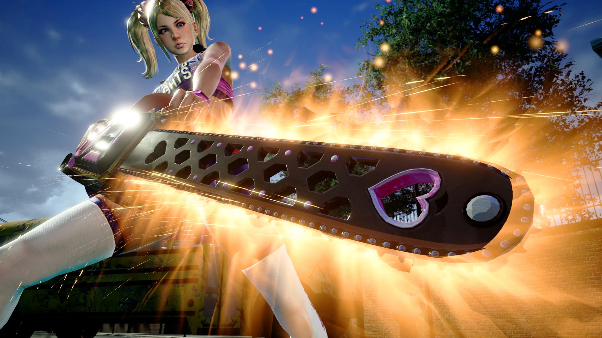 A still from Lollipop Chainsaw RePop showing Juliet wielding a chainsaw with a heart on it, it is glowing.