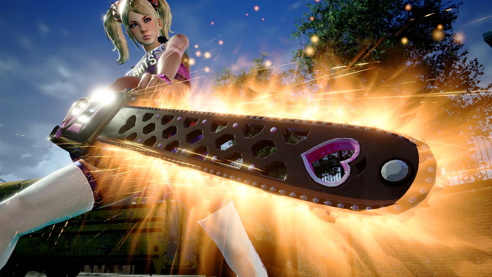 A still from Lollipop Chainsaw RePop showing Juliet wielding a chainsaw with a heart on it, it is glowing. - 1