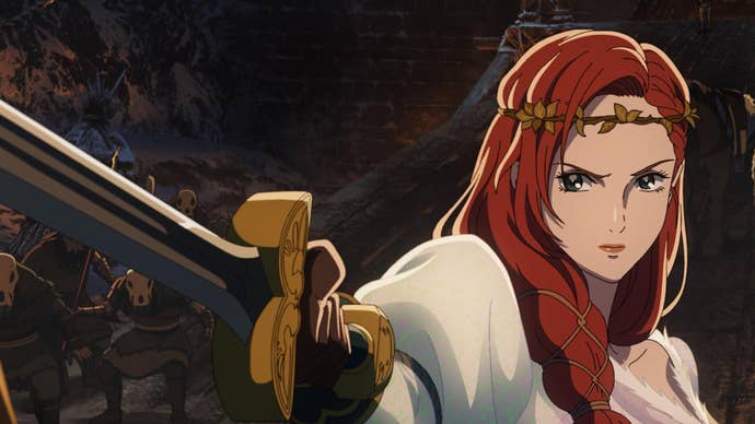 A woman with long red hair pointing a sword at something offscreen in The Lord of the Rings: The War of the Rohirrim.