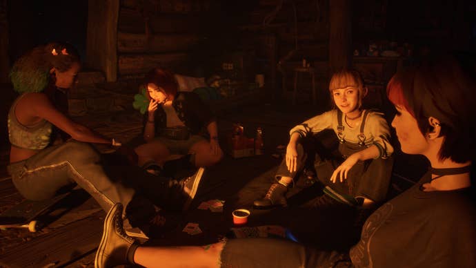 The four friends talking and laughing in the light of a fireplace in Lost Records: Bloom & Rage.
