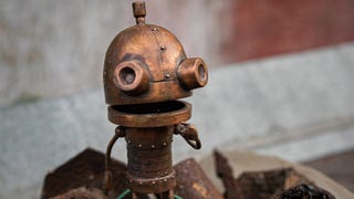 A bronze statuette of Machinarium's star, the scrap robot Josef.