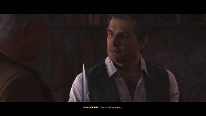 A Mafia: The Old Country Screenshot. Don Torrisi grips a knife threateningly.