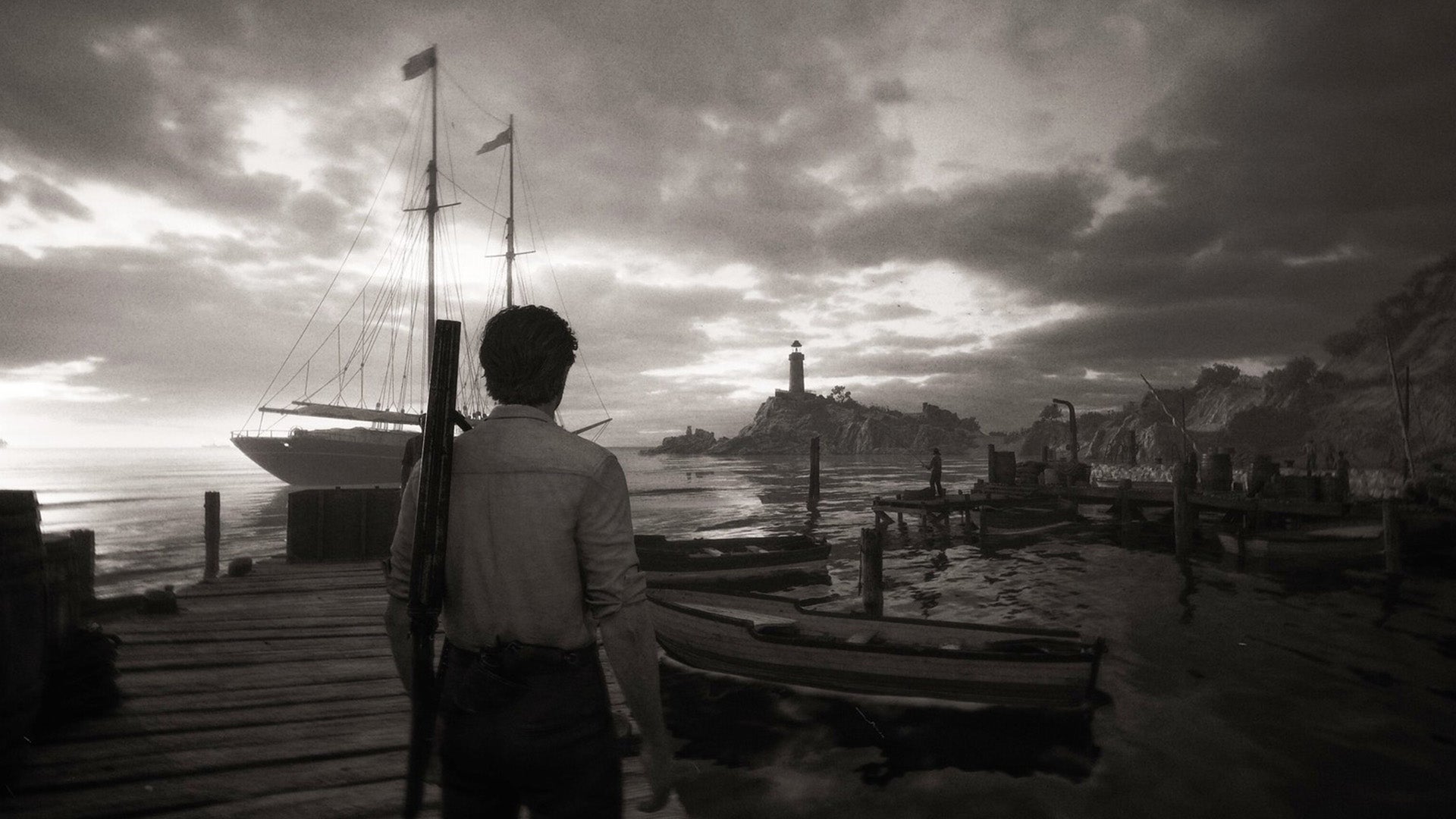 A man dressed in a white shirt and smart trousers with guns attached to him is overlooking a pier in a coastal Italian town in Mafia: The Old Country. The image is in black and white and is grainy, like it's from an old movie. - 1