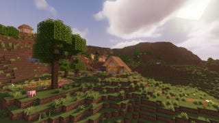 A Minecraft extreme hills landscape with a tree in the foreground and a village in the background.