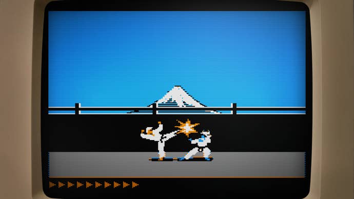 A close-up of an old computer monitor showing a sequence from 1984 classic martial arts game Karateka, with two fighters battling in front of a distant snow-capped mountain.