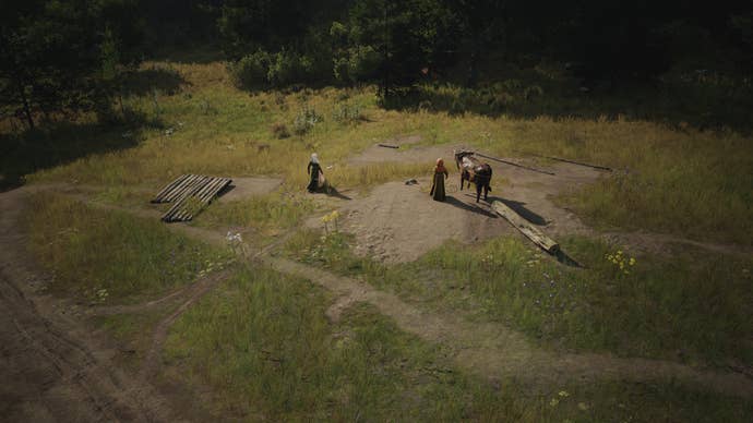 An Ox and two villagers prepare to construct a Logging Camp in Manor Lords.