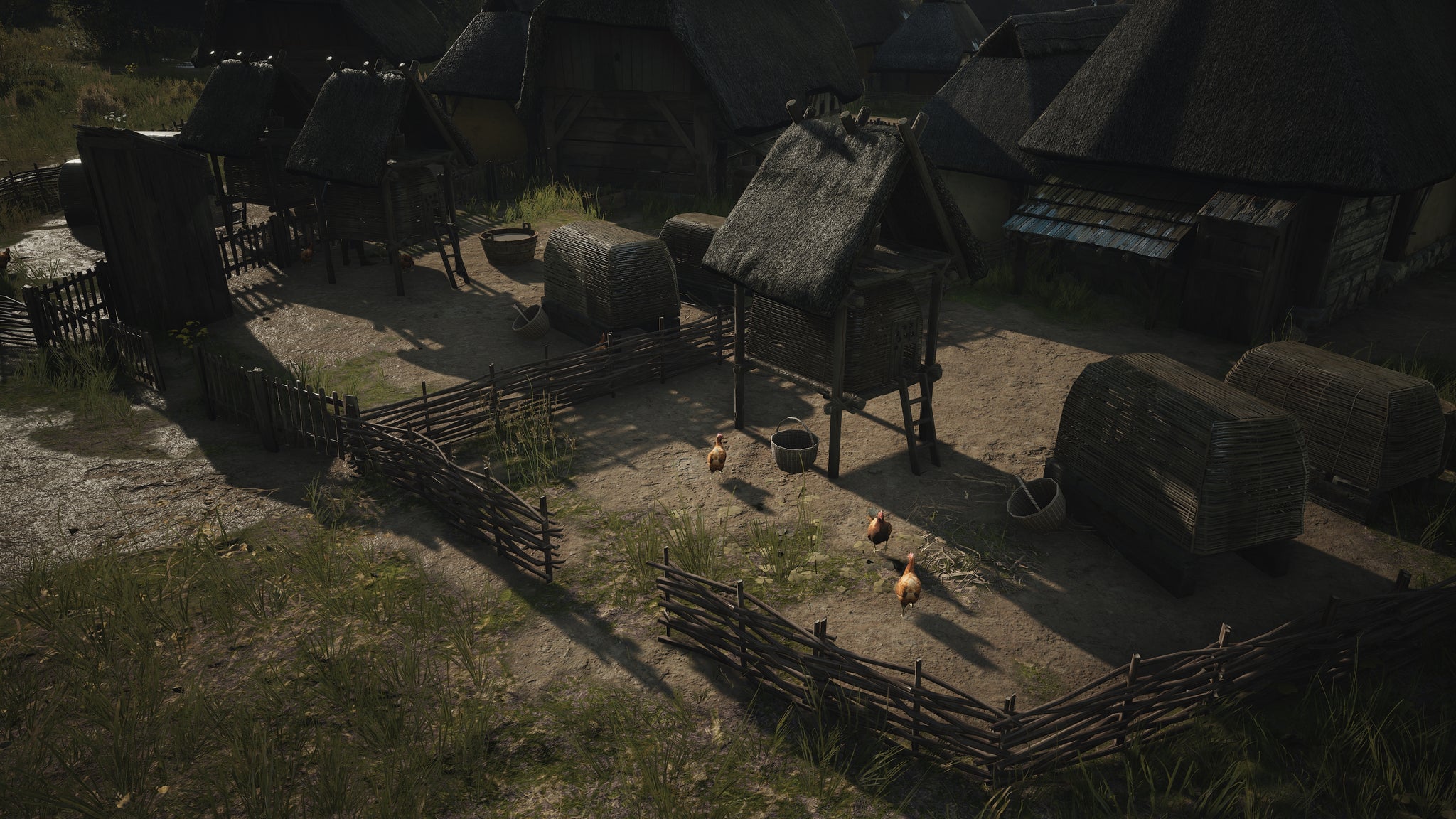 A close-up of two side-by-side Chicken Coops in Manor Lords. - 24