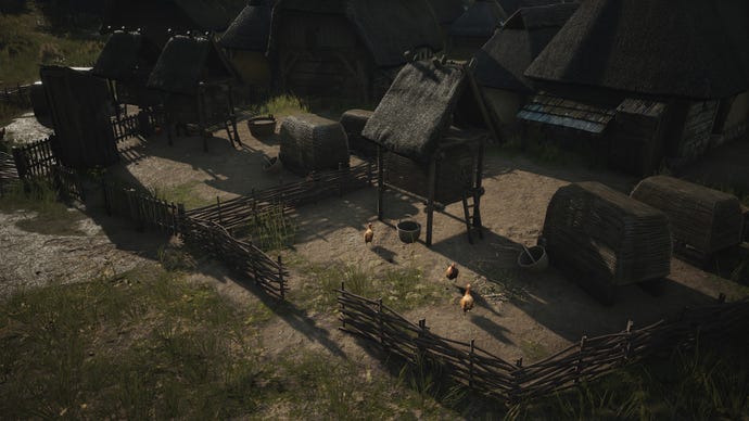 A close-up of two side-by-side Chicken Coops in Manor Lords.
