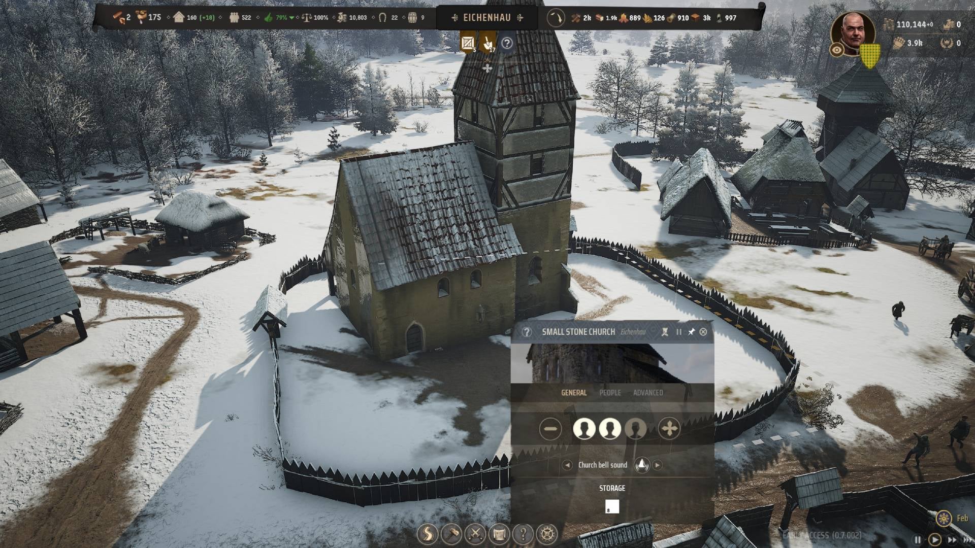 A church in a snowy field in Manor Lords