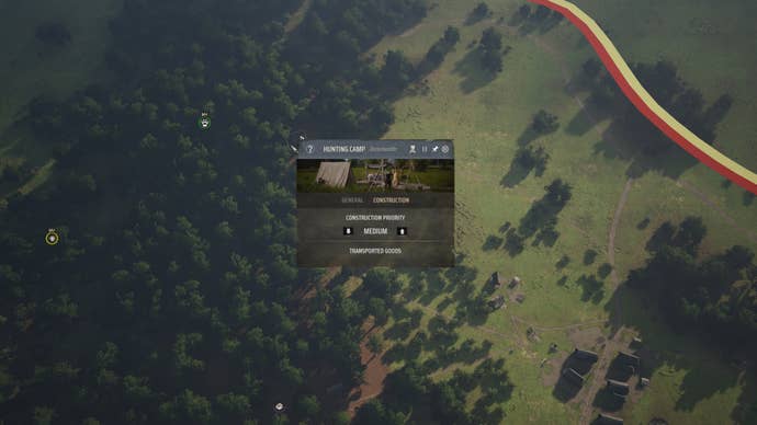 The player in Manor Lords constructs a Hunting Camp next to some Wild Animals in a forest.