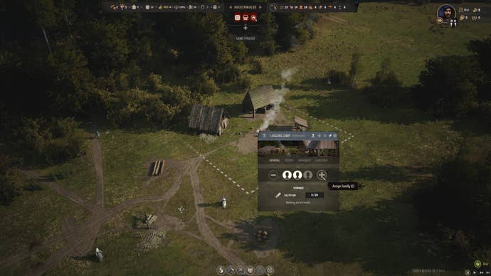 The player in Manor Lords assigns two families to work at a Logging Camp at the start of the game.