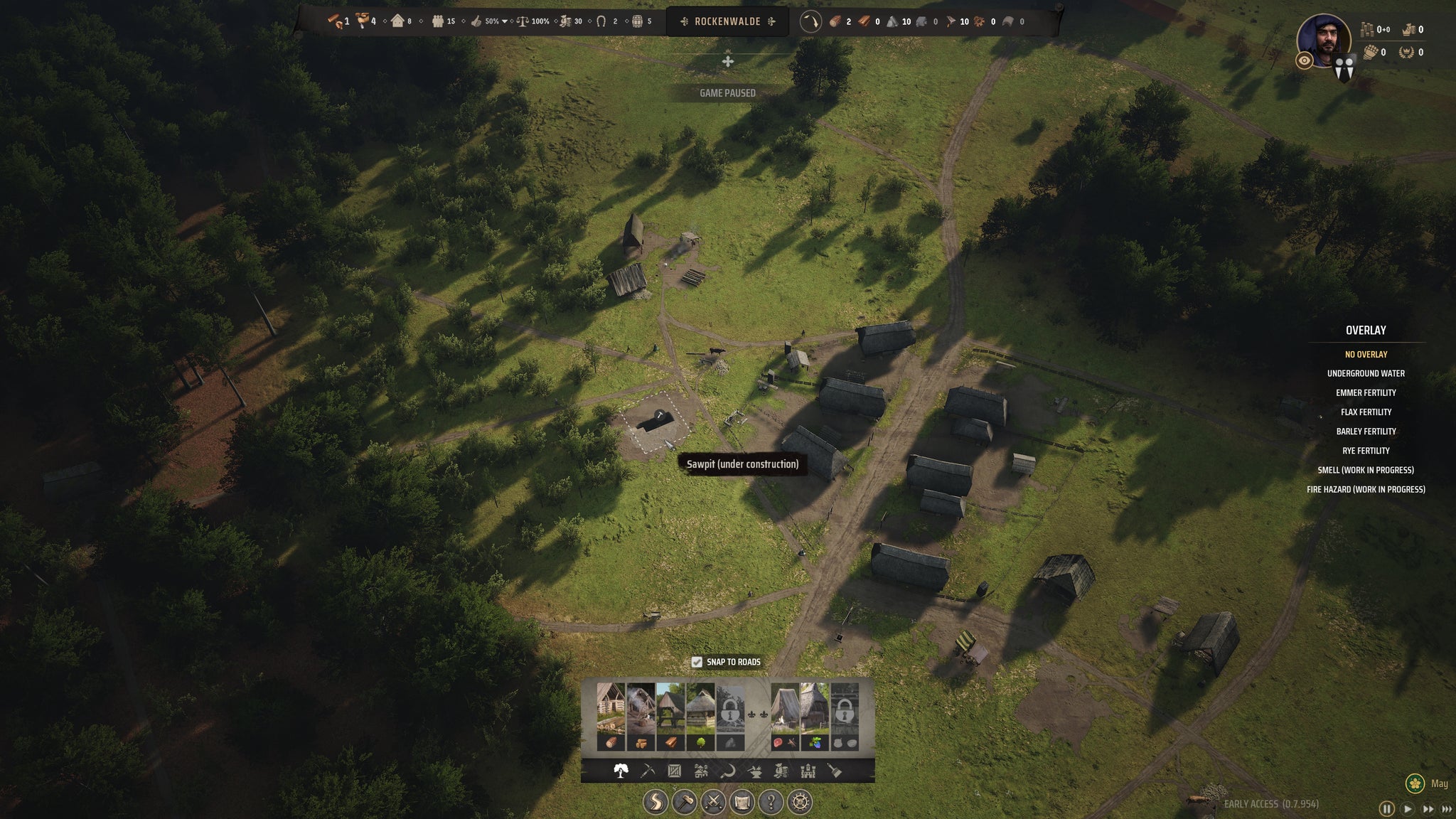 A Sawpit in the middle of construction on the edge of a Manor Lords village. - 18