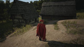 A man in a red cape stands in front of a trading post building in Manor Lords