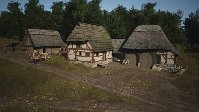 A Trading Post next to a road and a forest in Manor Lords.