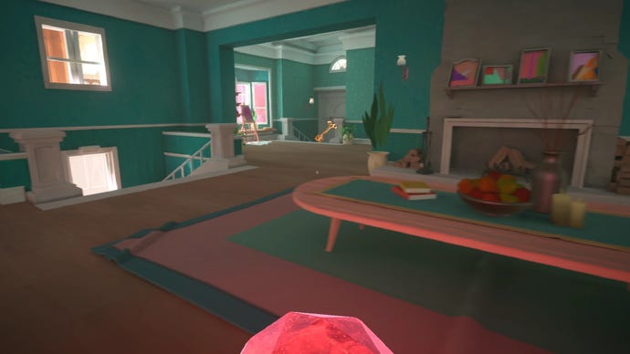 A screenshot of Maquette which shows me exploring a very green house. I have a red orb in my hand and there’s a big key directly opposite me.
