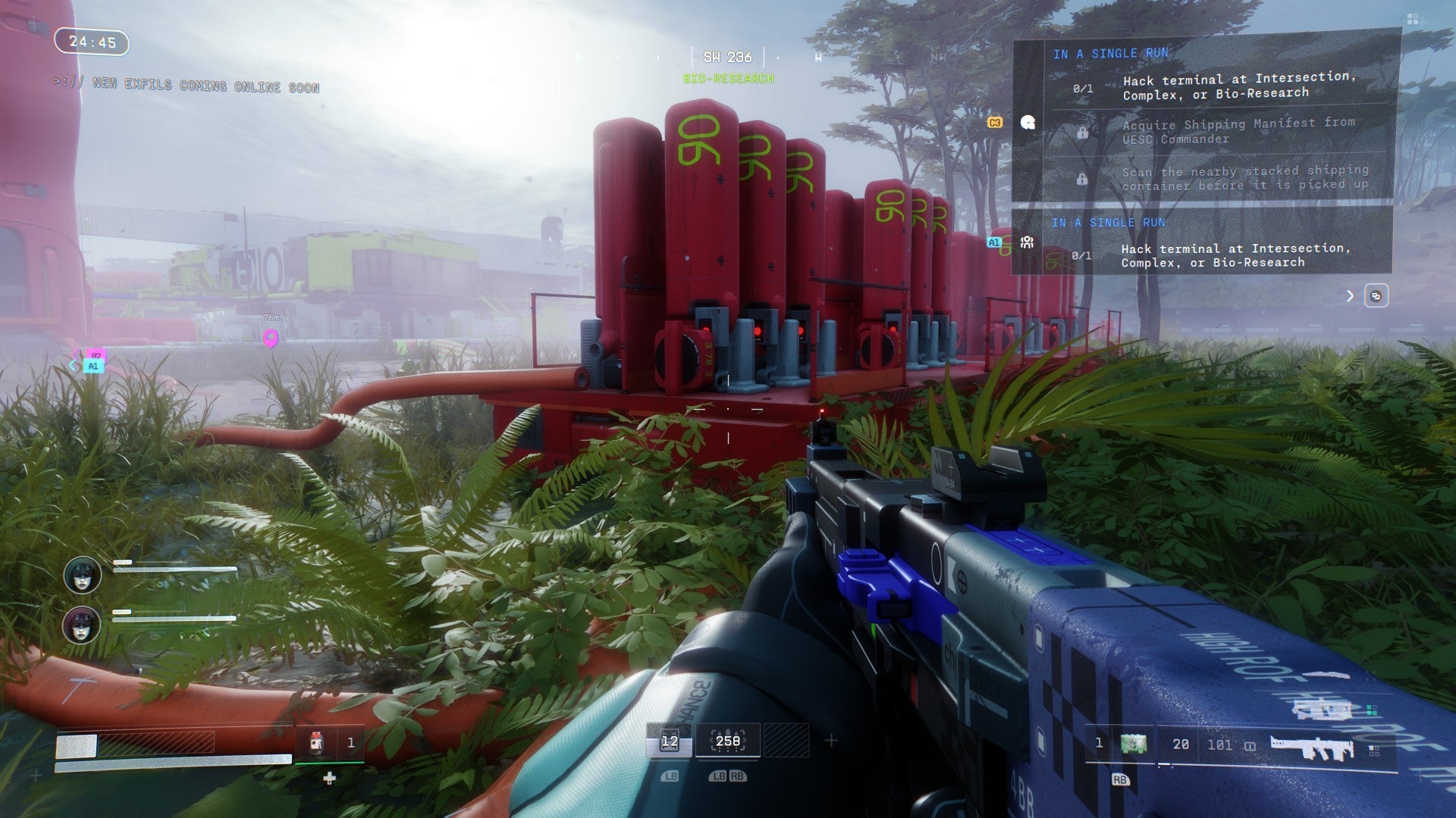 Marathon screenshot showing red storage cylinders amongst long grass