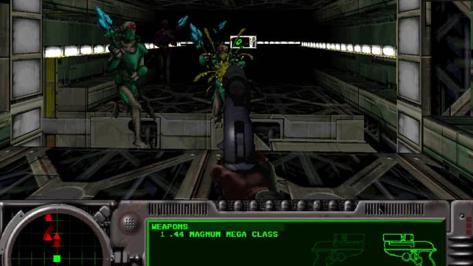 The player fires a pistol at two aliens in a spaceship corridor, killing one of the aliens.