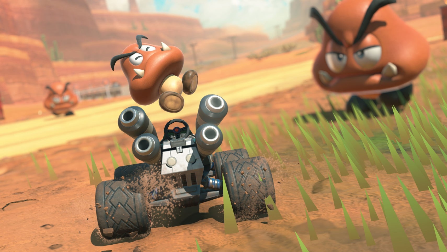 mario kart world goomba driving a kart
