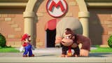 Mario stares at Donkey Kong who is carrying a sack over his shoulder