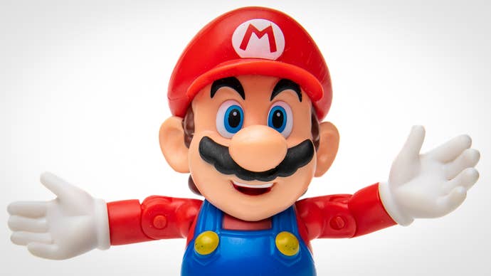A close-up of a plastic Mario figurine, with its arms spread, in a welcoming gesture. I’m not sure what he’s welcoming us to, though - there’s nothing else around.